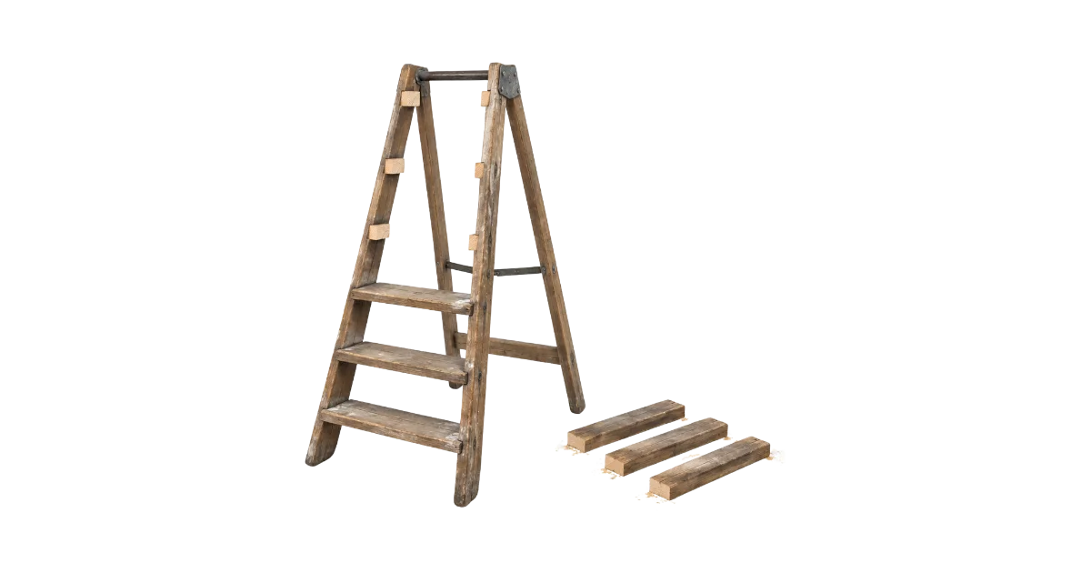 Escabeau en bois dont plusieurs barreaux ont été retirés et posés au sol, image d'une échelle de maturité incomplète